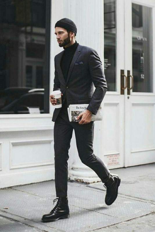 all black outfit with newspaper and coffee